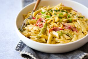 rasta pasta inside of a white bowl