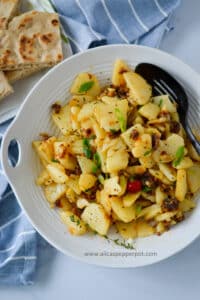 pan-fried potatoes cooked with garlic onions pepper