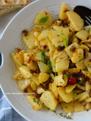 pan-fried potatoes cooked with onions garlic pepper