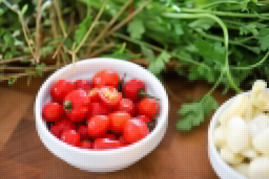 this image shows a bowl with a lot of wiri wiri pepper in it
