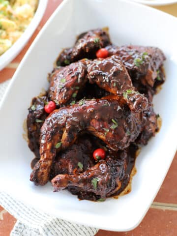 this is a photo of pot roast chicken in a white bowl