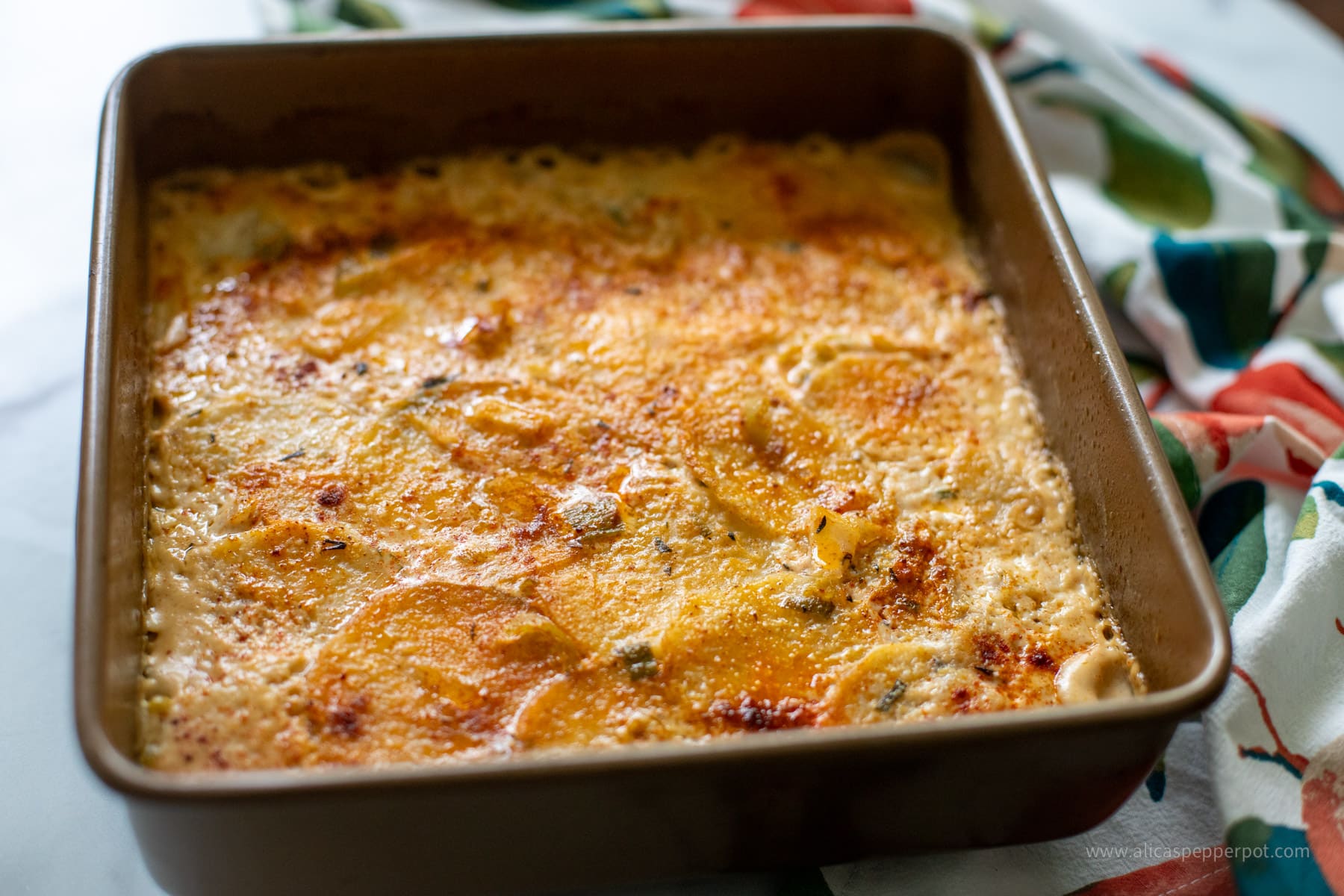 Scallopededdoebakedmetalpanangle Alica's Pepperpot