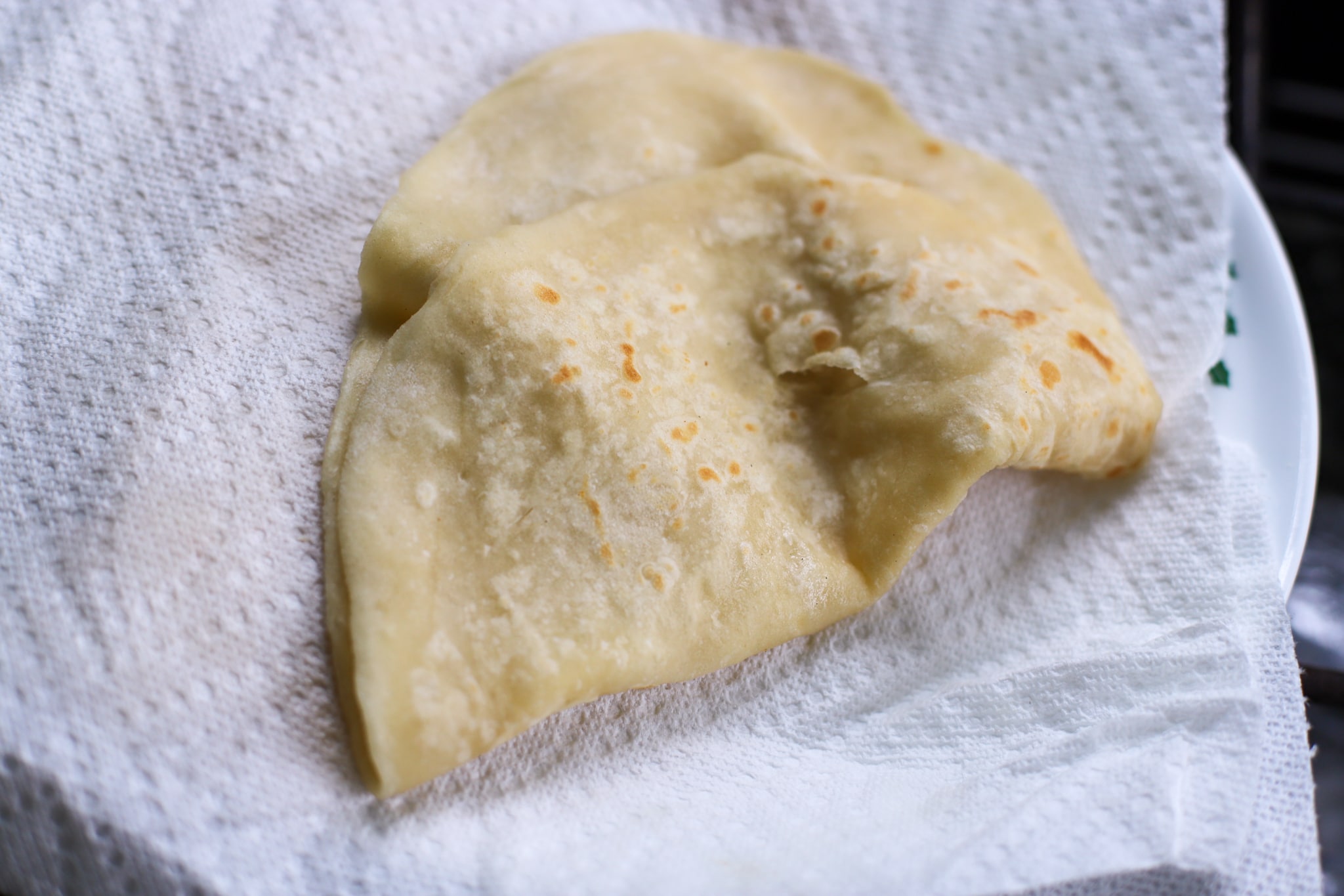roti after being cooked and coming off the tawa