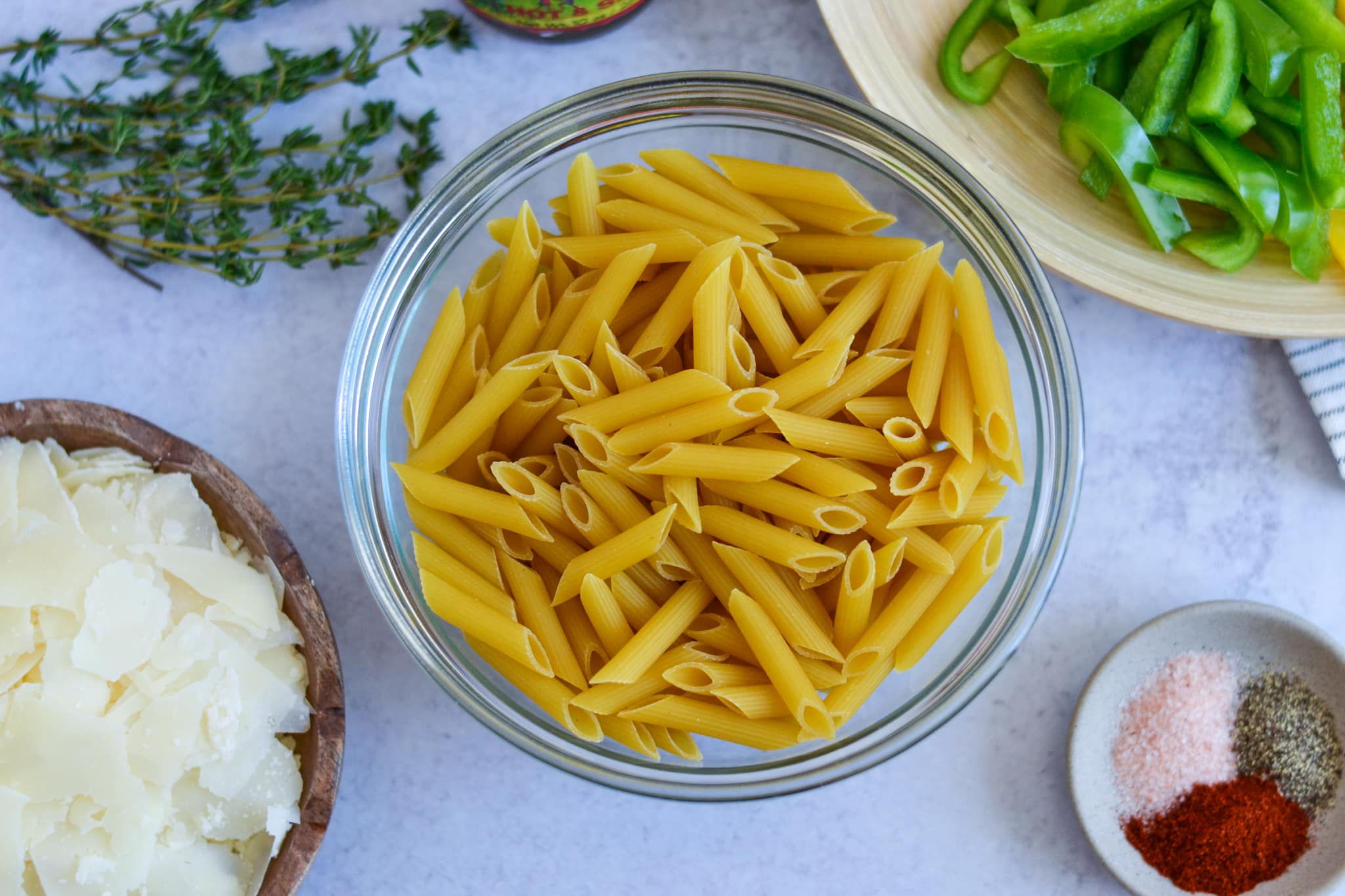 penne pasta in a clear bowl