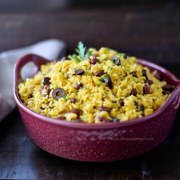 Yellow rice in a purple bowl